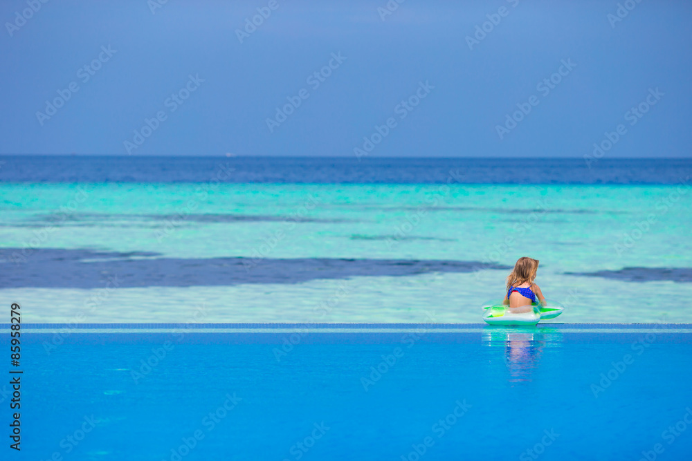 Little happy adorable girl in outdoor swimming pool Little happy adorable girl in outdoor swimming pool