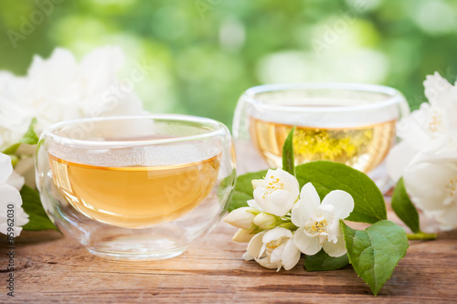 Two cups of healthy jasmine tea, herbal medicine.