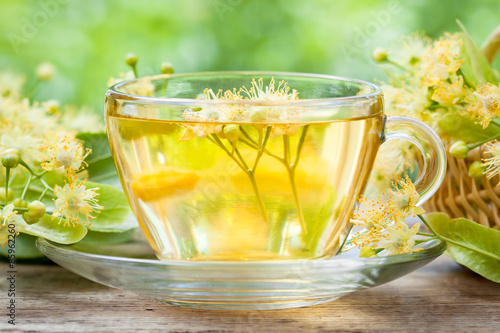 Cup of healthy linden tea, herbal medicine.