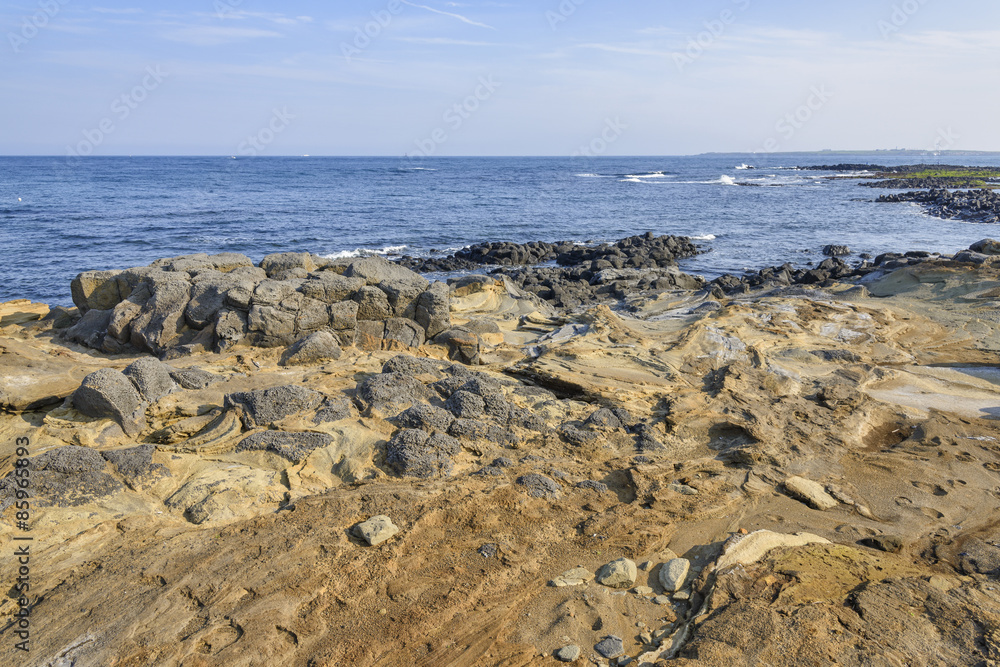 Coast of Jeju island with Volcanic rocks