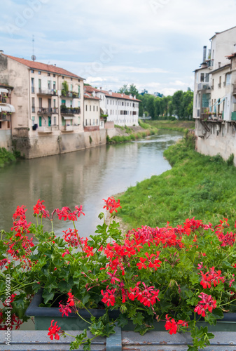 Flowered railing of Angels' bridge over the river Bacchiglione, Vicenza © siculodoc