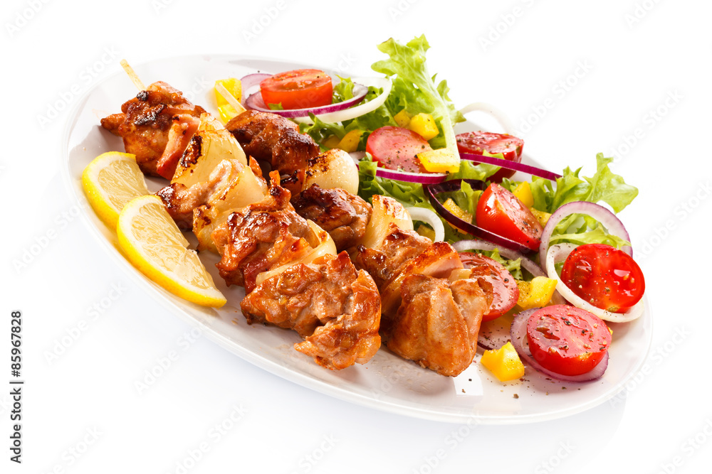 Shashlik - grilled meat and vegetables Shashlik - grilled meat and vegetables