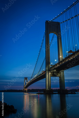The bridge connecting Brooklyn to Staten Island named Verrazano bridge seen at dusk © Victor Moussa