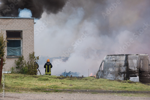 Fire of buildings and cars photo