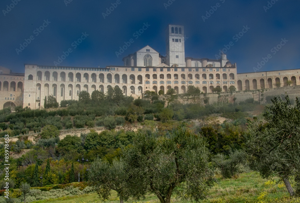 Beautiful view of the ancient town of Assisi with blue sky, Umbr