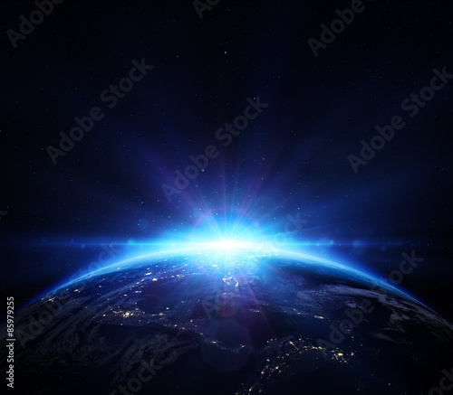 planet earth with sunrise in the space - horizon blue shining in Usa
