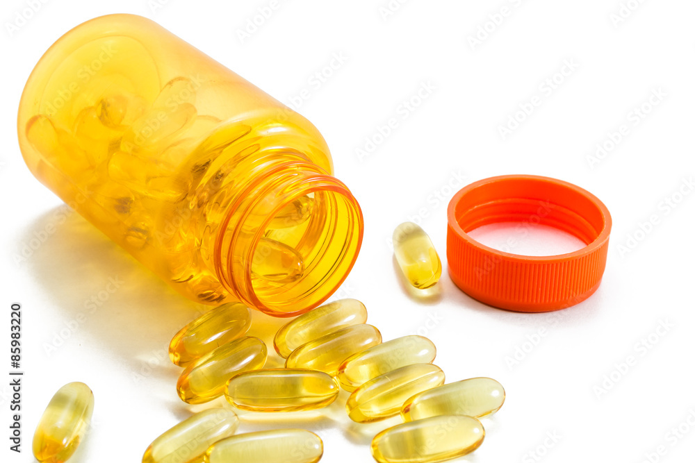 fish oil capsules and Bottles on white background fish oil capsules and Bottles on white background