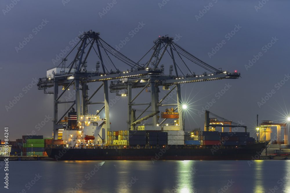Container Cargo freight ship with working  Export at twilight