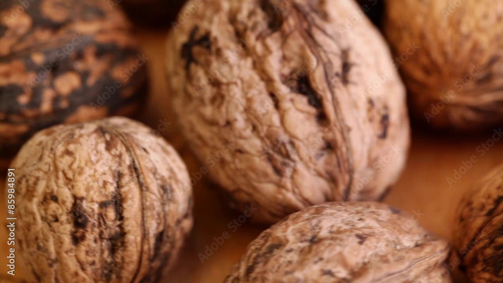 HD 1080 close up: walnut fruits at rotating display HD 1080 close up: walnut fruits at rotating display