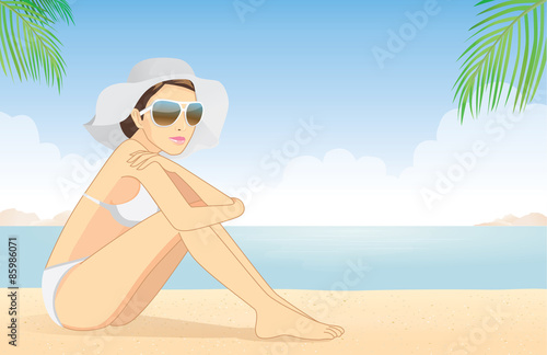 Bikini women wear sunglasses and hat for protection skin relax on beach of the sea