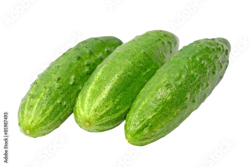 Three ripe green cucumbers.Isolated.