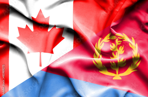 Waving flag of Eritrea and Canada
