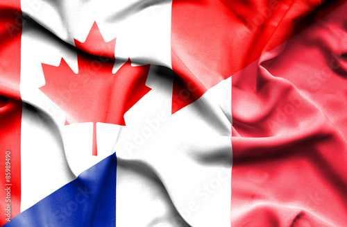 Waving flag of France and Canada