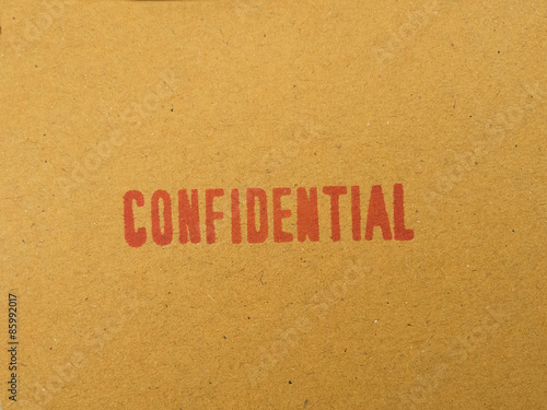 "Confidential" printed on brown vintage envelope, in macro