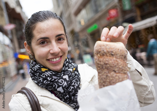 Photography Young woman with Kurtos Kalacs in Hungary