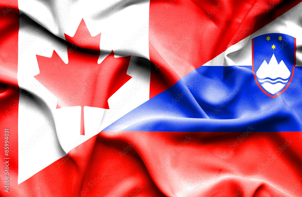 Waving flag of Slovenia and Canada
