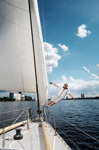 Captain on a yacht during race © Nejron Photo