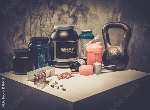 Bodybuilding nutrition supplements and chemistry photo