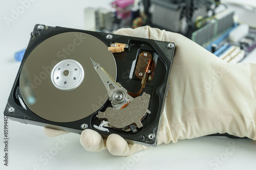 Canvas-taulu opened hard disk drive in hand