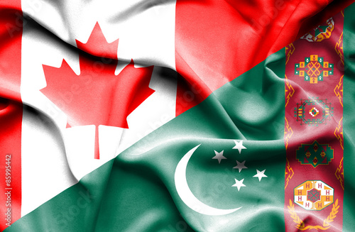 Waving flag of Turkmenistan and Canada