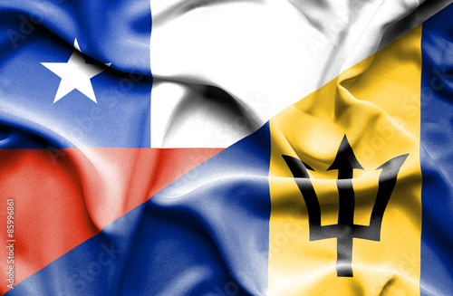 Waving flag of Barbados and Chile