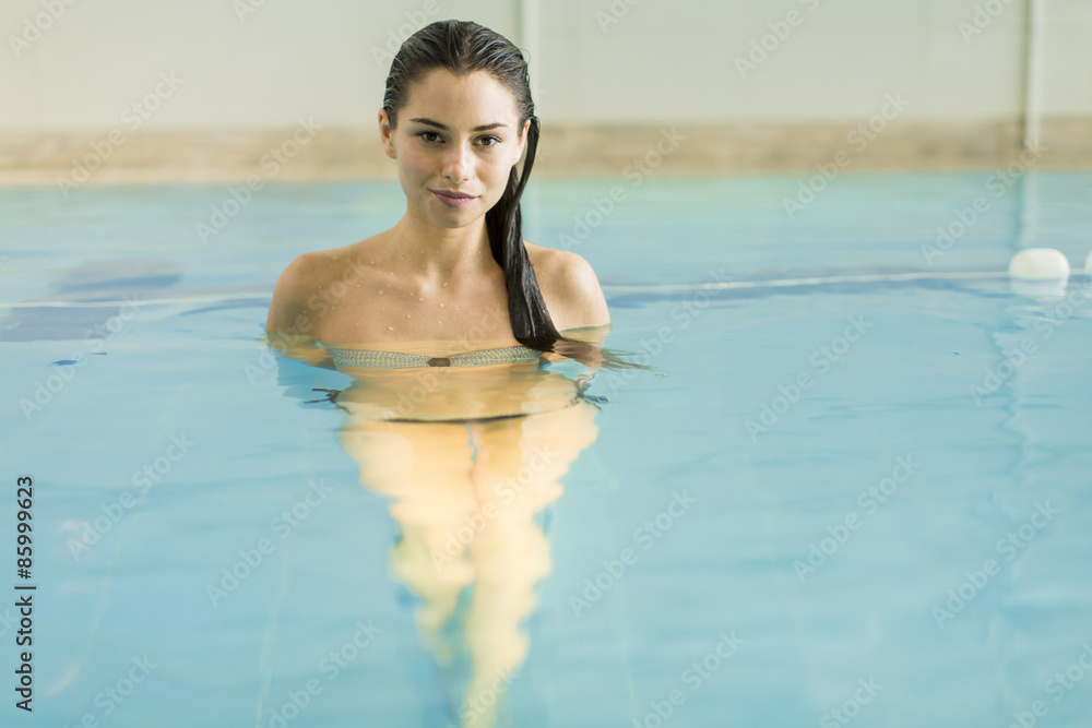 Young woman in the pool