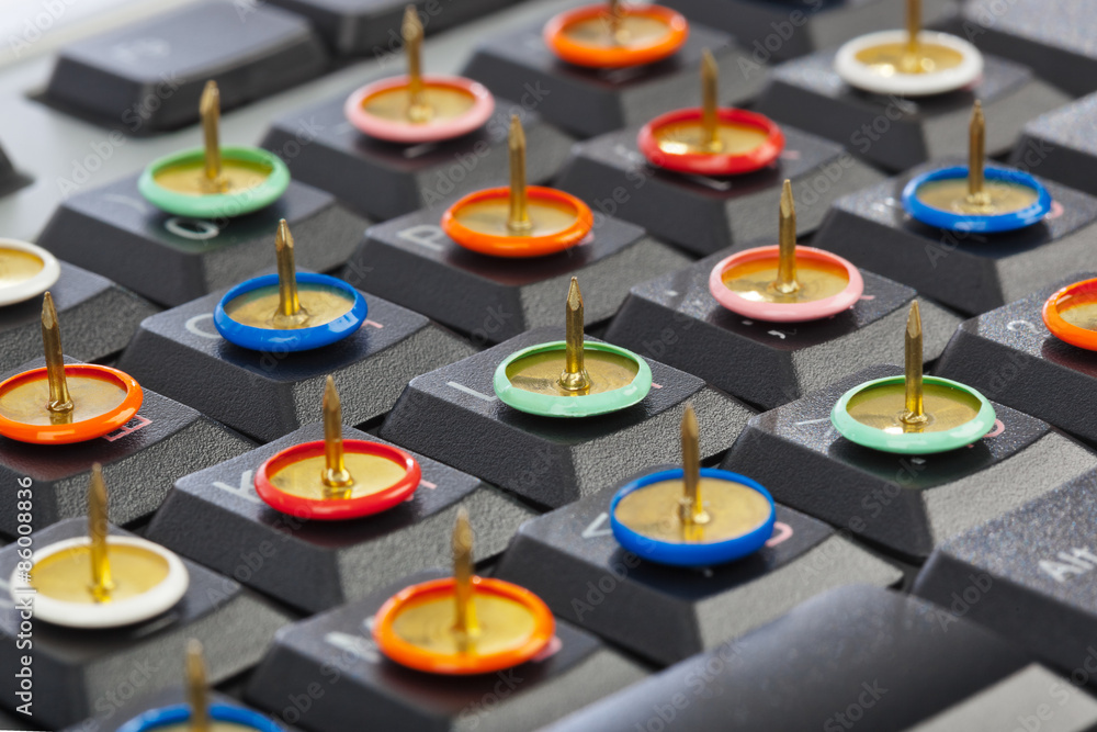 Pins on computer keyboard Pins on computer keyboard