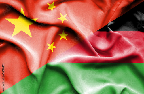 Waving flag of Malawi and China