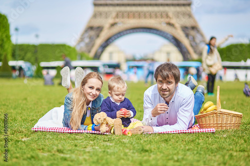 Happy family of three in Paris photo