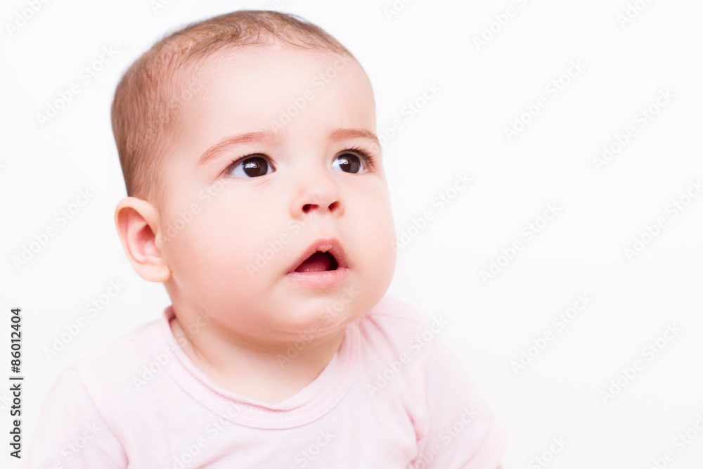 Close-up portrait of a beautiful baby on white background Close-up portrait of a beautiful baby on white background