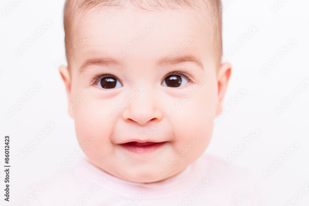 Close-up portrait of a beautiful baby on white background Close-up portrait of a beautiful baby on white background