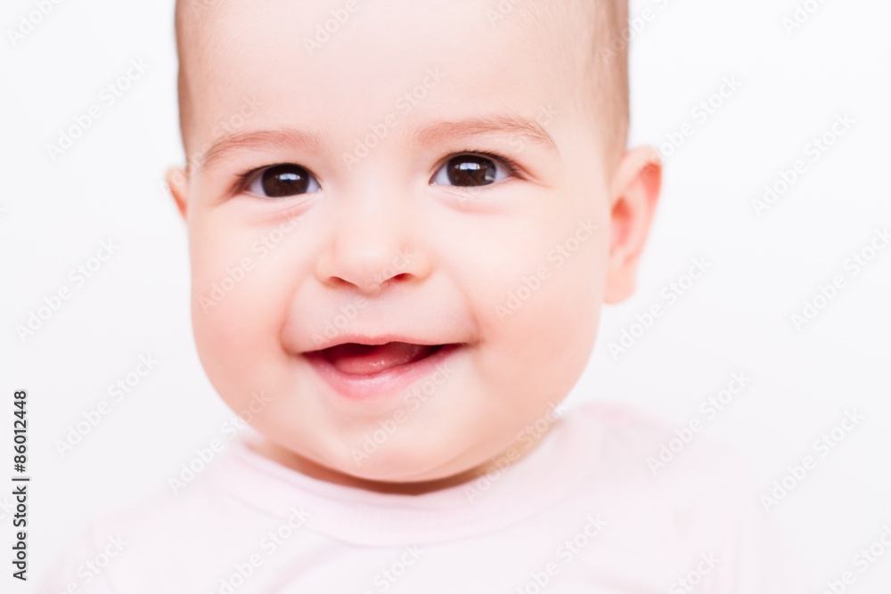 Close-up portrait of a beautiful baby on white background Close-up portrait of a beautiful baby on white background