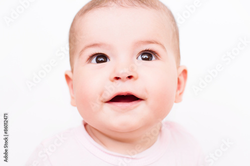 Close-up portrait of a beautiful sleeping baby on white