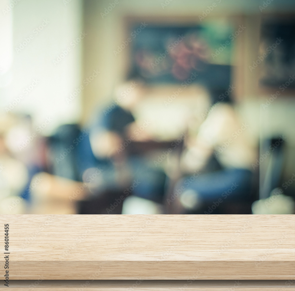 Empty wood table and blurred cafe with bokeh background Empty wood table and blurred cafe with bokeh background