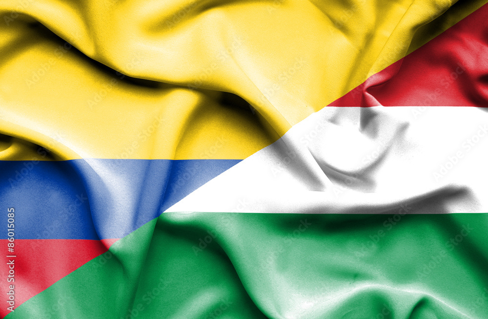 Waving flag of Hungary and Columbia Waving flag of Hungary and Columbia