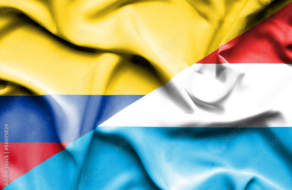 Waving flag of Luxembourg and Columbia