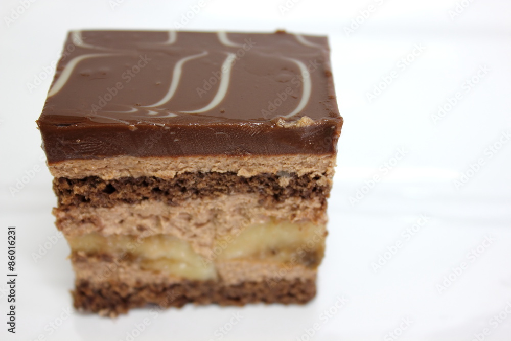 Chocolate sponge cakes on white plate. Chocolate sponge cakes on white plate.