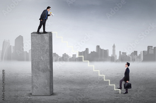 Valokuva Corporate leader shouting on his partner