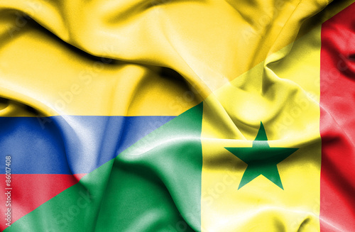 Waving flag of Senegal and Columbia