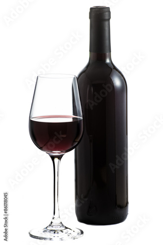 Bottle of red wine with glass on white background