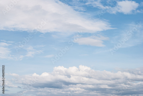 Fototapeta Naklejka Na Ścianę i Meble -  white fluffy clouds in the blue sky, for background
