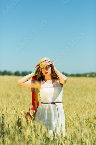 Wallpaper Mural Happy girl holding colorful ribbons Torontodigital.ca