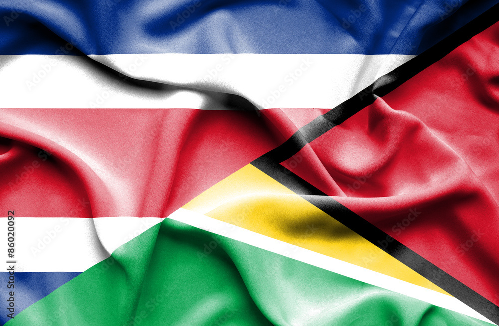 Waving flag of Guyana and Costa Rica Waving flag of Guyana and Costa Rica