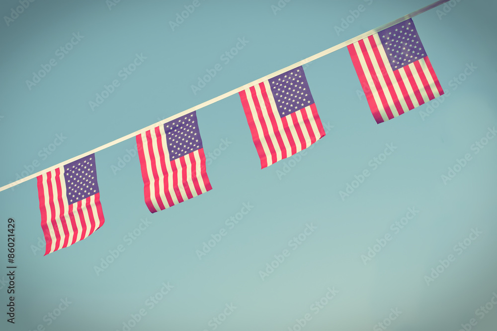 USA flags hanging prowdly for July 4 Independance Day USA flags hanging prowdly for July 4 Independance Day