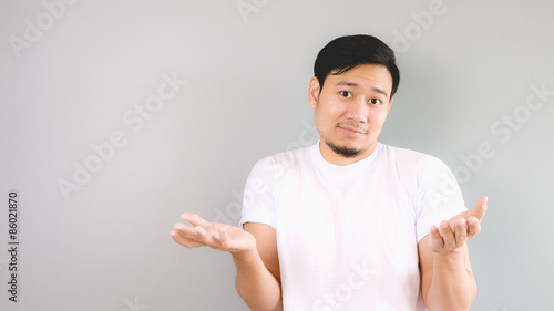 Canvas Print Rasing his shoulder and arms as the decision and choise  is up t