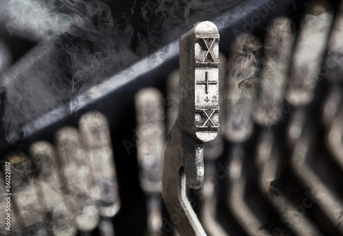 X hammer - old manual typewriter - mystery smoke