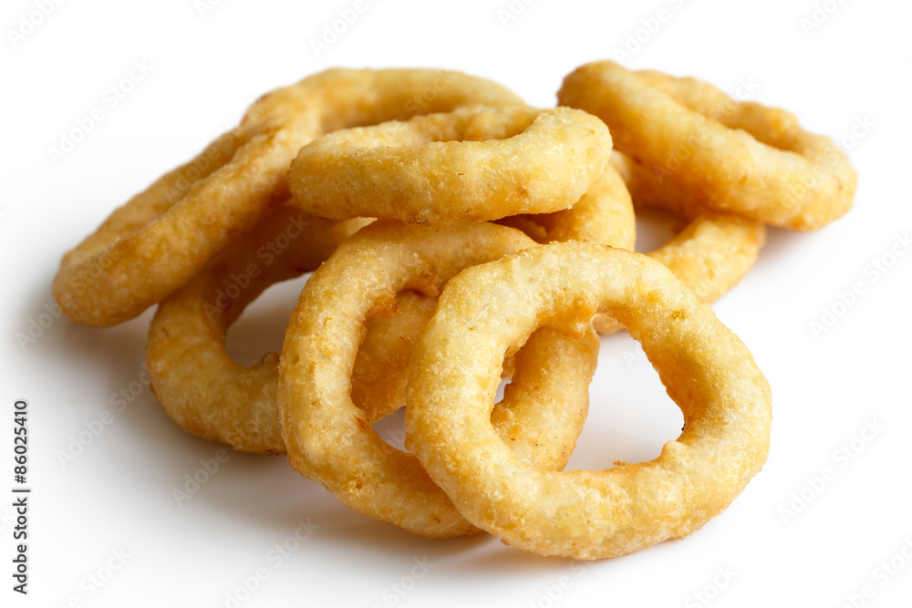 Heap of deep fried onion or calamari rings isolated on white. Heap of deep fried onion or calamari rings isolated on white.