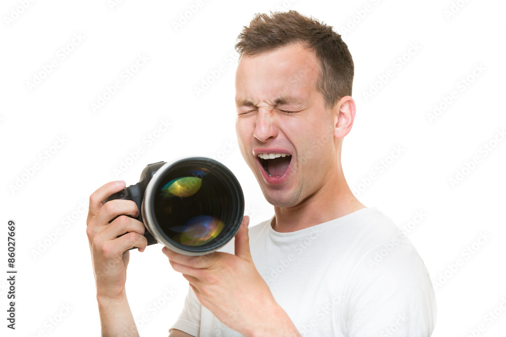 Young pro photographer with digital camera Young pro photographer with digital camera