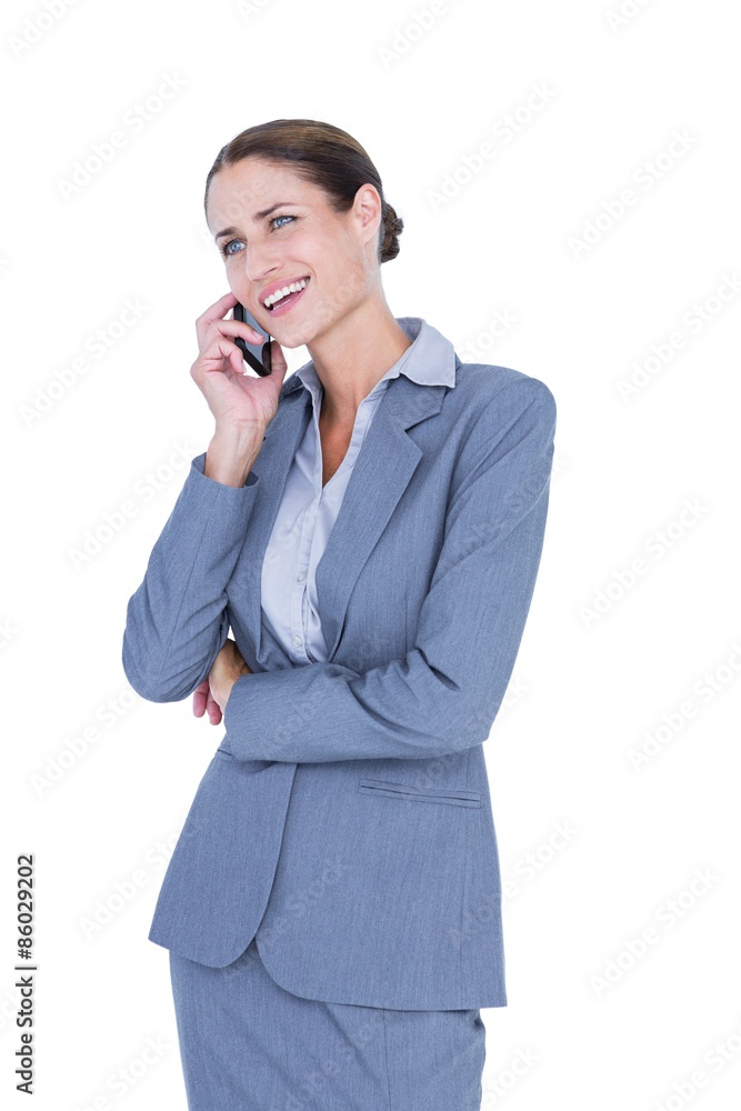 Businesswoman calling with her smartphone Businesswoman calling with her smartphone