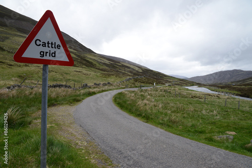 Panneau dans les Highlands indiquant la présence de barrières pour le bétail